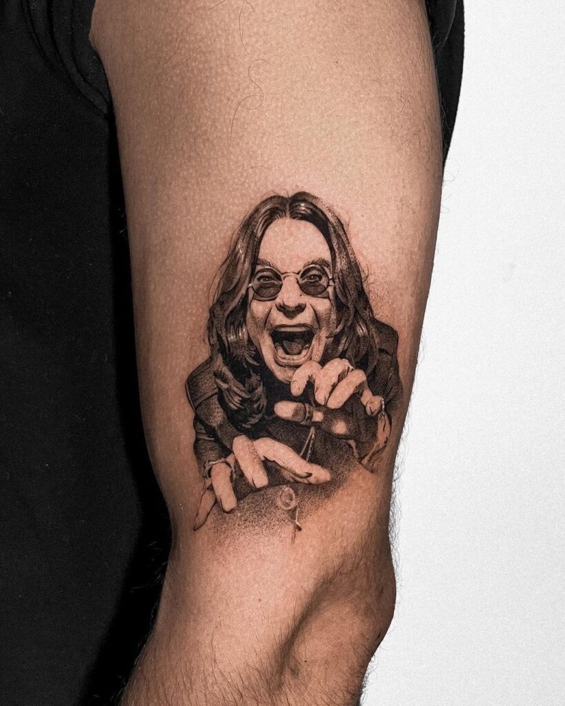 A black and grey micro realistic portrait of the singer Ozzy Osbourne. 