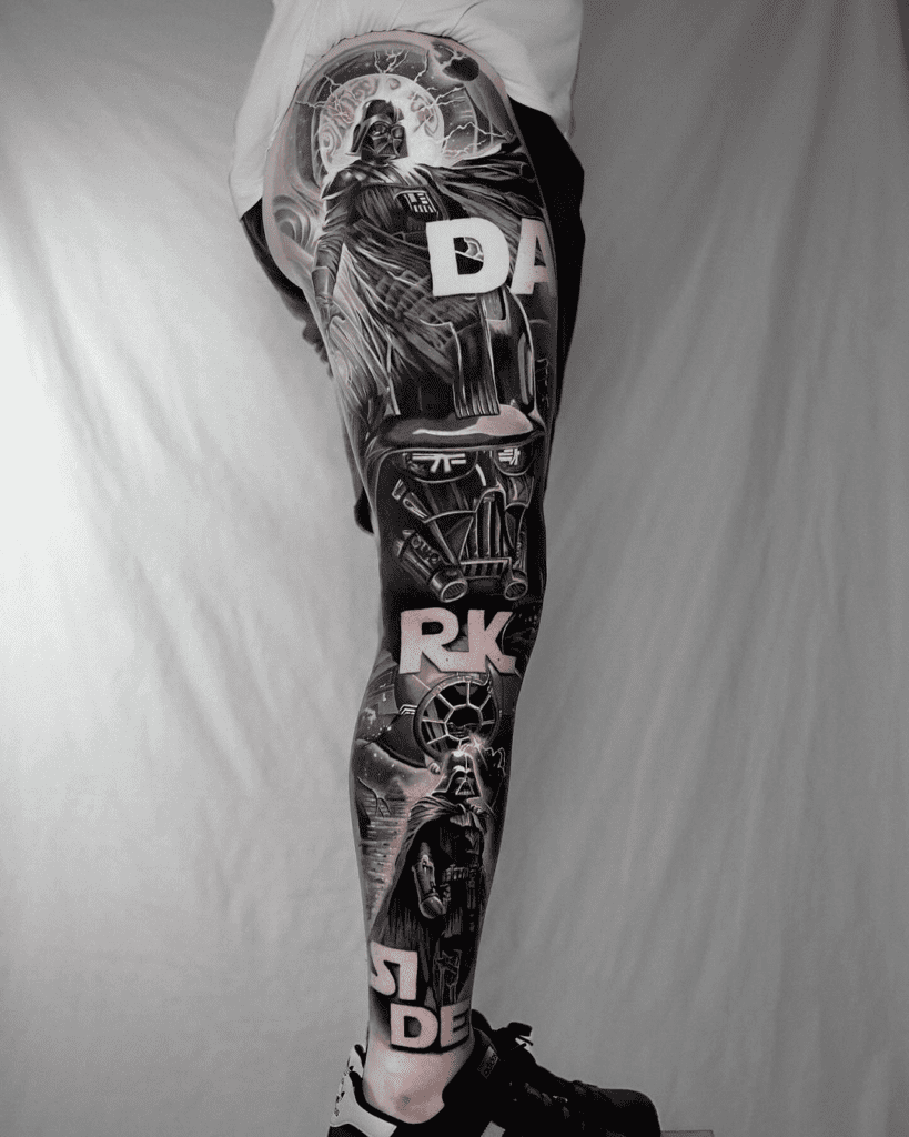 Star Wars tattoos: A black and grey leg sleeve tattoo of Darth Vader with the word Darkside split up across the leg. 