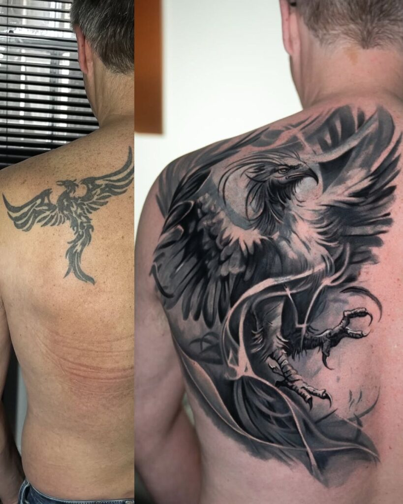 a tattoo cover up shows a small black phoenix tattoo on the left of the image and a large black and grey back piece which covered it up.