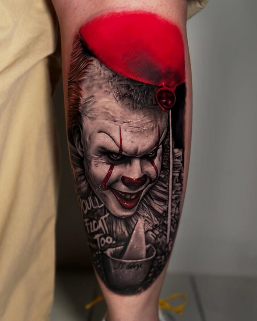 Halloween tattoos: Pennywise the clown holding a red balloween from the horror film 'It'