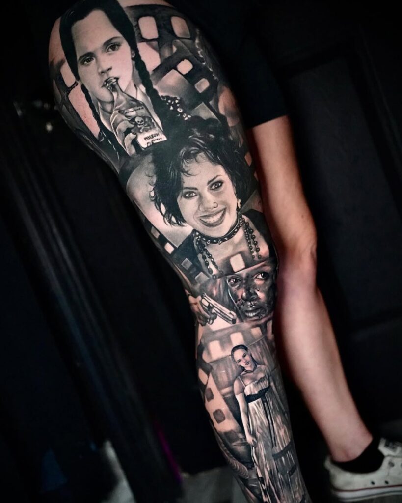 A black and gray leg sleeve showing a collage of horror film icons including Wednesday Addams, Nancy from the Craft and Jennifer from Jennifer's body.