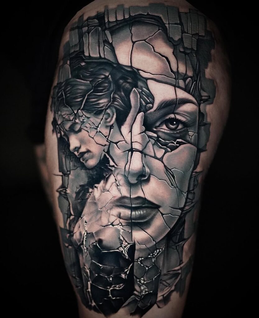 A portrait tattoo of a woman's face broken into pieces by Joan Pereira. 