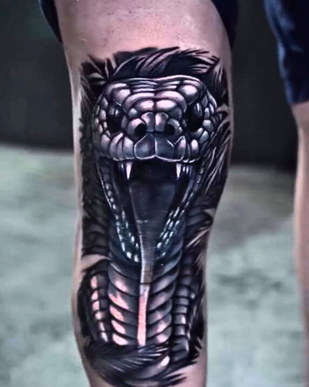 Snake tattoo Joan No Regrets Miami
